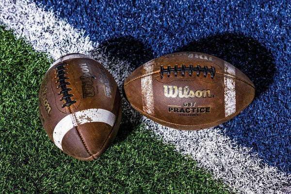 Fine Art Print: Paris Texas, USA - Two Footballs On Field, Paris Texas Wildcats by Panoramic Images