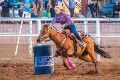 Panoramic Images - Framed Fine Art Prints: Cowgirl Rides Fast For Best Time During San Miguel Basin Rodeo, San Miguel County Fairgrounds, Norwood, Colorado by Panoramic Images