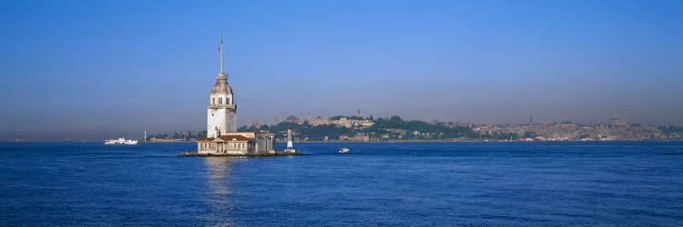 Lighthouse in the sea with mosque in the backgroundLeander's Tower, Blue Mosque, Istanbul, Turkey