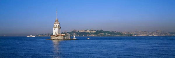 Istanbul: Lighthouse in the sea with mosque in the backgroundLeander's Tower, Blue Mosque, Istanbul, Turkey by Panoramic Images