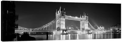 Low angle view of a bridge lit up at night, Tower Bridge, London, England (black & white) Canvas Art Print