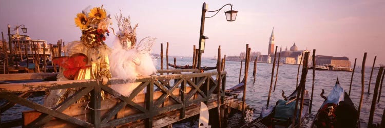 Italy, Venice, St MarkÕs Basin, people dressed for masquerade