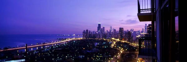 Chicago Skylines: High angle view of a city at night, Lake Michigan, Chicago, Cook County, Illinois, USA by Panoramic Images