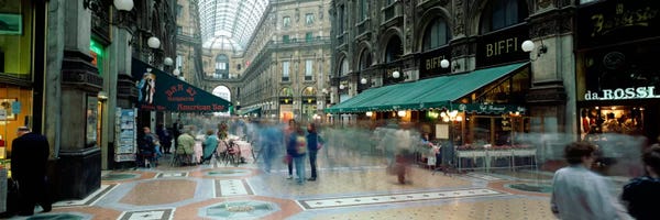 Lombardy: Bluured Motion Of Shoppers, Galleria Vittorio Emanuele II, Milan, Lombardy, Italy by Panoramic Images