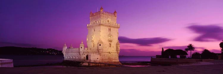 An Illuminated Belem Tower (Tower Of St. Vincent) At Night, Santa Maria de Belem, Lisbon, Portugal