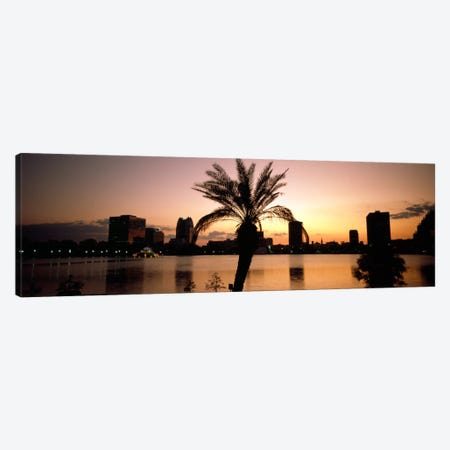 Silhouette of buildings at the waterfront, Lake Eola, Summerlin Park, Orlando, Orange County, Florida, USA Canvas Print #PIM1895} by Panoramic Images Canvas Print