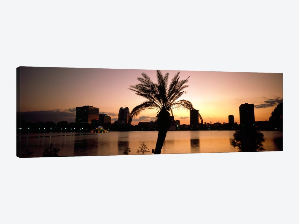 Silhouette of buildings at the waterfront, Lake Eola, Summerlin Park, Orlando, Orange County, Florida, USA by Panoramic Images 1-piece Art Print