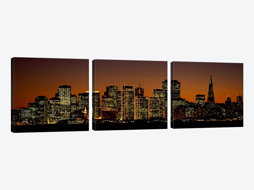Skyscrapers lit up at nightSan Francisco, California, USA by Panoramic Images 3-piece Art Print