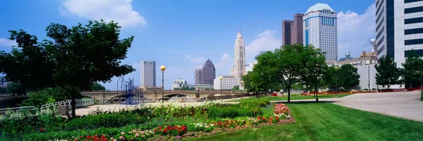 Ohio: Garden in front of skyscrapers in a city, Scioto River, Columbus, Ohio, USA by Panoramic Images