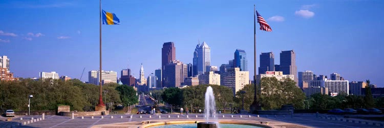 Fountain at art museum with city skyline, Philadelphia, Pennsylvania, USA