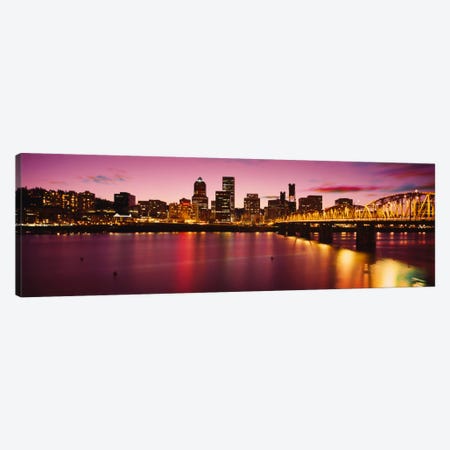Skyscrapers lit up at sunset, Willamette River, Portland, Oregon, USA Canvas Print #PIM1936} by Panoramic Images Canvas Art