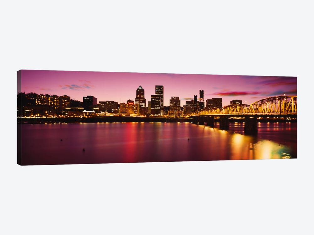 Skyscrapers lit up at sunset, Willamette River, Portland, Oregon, USA by Panoramic Images 1-piece Canvas Art Print