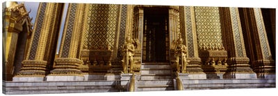 Low angle view of statues in front of a temple, Phra Mondop, Grand Palace, Bangkok, Thailand Canvas Art Print - Buddhism Art