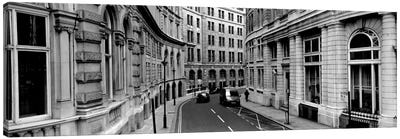 Buildings along a road, London, England Canvas Art Print - Black & White Cityscapes