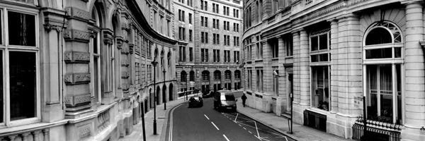 Black & White Cityscapes: Buildings along a road, London, England by Panoramic Images