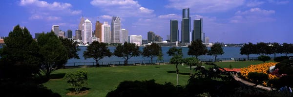 Detroit: Trees in a park with buildings in the background, Detroit, Wayne County, Michigan, USA by Panoramic Images