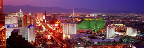 Nevada: Buildings lit up at dusk in a city, Las Vegas, Clark County, Nevada, USA by Panoramic Images