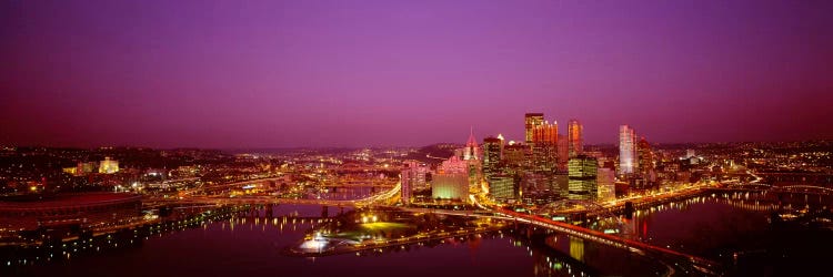 High angle view of buildings lit up at night, Three Rivers Stadium, Pittsburgh, Pennsylvania, USA