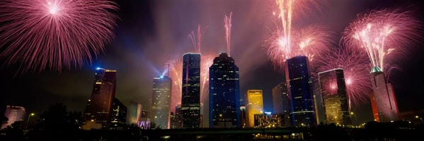 Fireworks Over Buildings In A City, Houston, Texas, USA