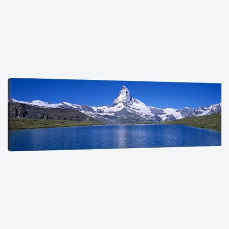 A Snow Covered Matterhorn With Reffelsee In The Foreground, Valais, Switzerland Canvas Print #PIM2106} by Panoramic Images Canvas Print