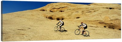 Side profile of two men mountain bilking on rocks, Slickrock Trail, Moab, Utah, USA Canvas Art Print - Bicycle Art