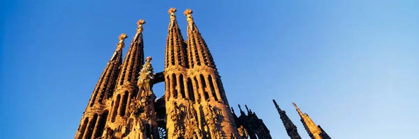 La Sagrada Familia: Low angle view of a churchSagrada Familia, Barcelona, Spain by Panoramic Images