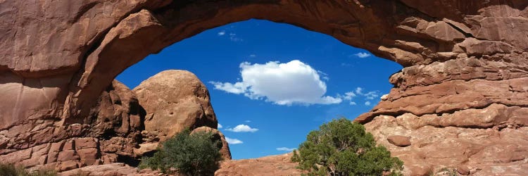 Cloudy Low-Angle View Through The North Window (One Of The Spectacles), Arches National Park, Utah, USA