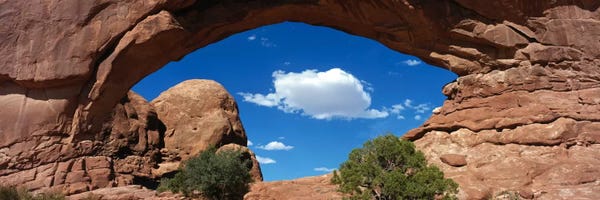 Arches National Park: Cloudy Low-Angle View Through The North Window (One Of The Spectacles), Arches National Park, Utah, USA by Panoramic Images