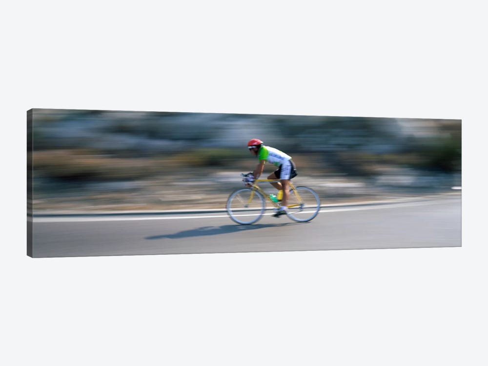 Bike racer participating in a bicycle raceSitges, Barcelona, Catalonia, Spain by Panoramic Images 1-piece Art Print