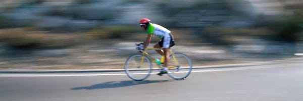 Spain: Bike racer participating in a bicycle raceSitges, Barcelona, Catalonia, Spain by Panoramic Images