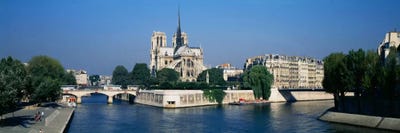 Cathedral along a river, Notre Dame Cathedral, Seine River, Paris, France by Panoramic Images framed canvas print