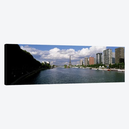 Distant View Of The Eiffel From The Seine River, Paris, France Canvas Print #PIM2207} by Panoramic Images Canvas Wall Art