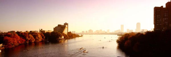 City Sunrises & Sunsets: Boats in the river with cityscape in the background, Head of the Charles Regatta, Charles River, Boston, Massachusetts, USA by Panoramic Images