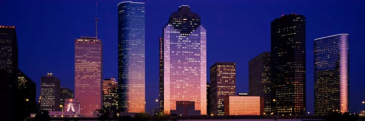 Skyscrapers lit up at night, Houston, Texas, USA