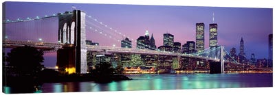 An Illuminated Brooklyn Bridge With Lower Manhattan's Financial District Skyline In The Background, New York City, New York  Canvas Art Print - Panoramic Photography