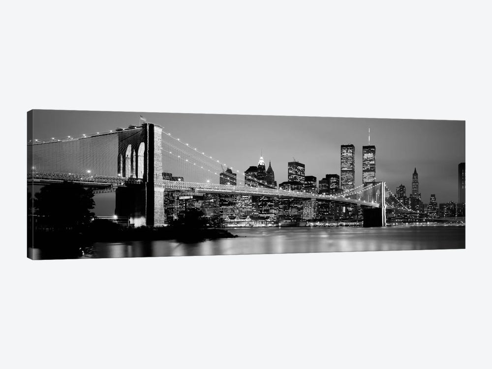 Illuminated Brooklyn Bridge With Lower Manhattan's Financial District Skyline In The Background In B&W, New York City, New York  by Panoramic Images 1-piece Canvas Wall Art