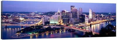 Buildings in a city lit up at dusk, Pittsburgh, Allegheny County, Pennsylvania, USA Canvas Art Print - Places