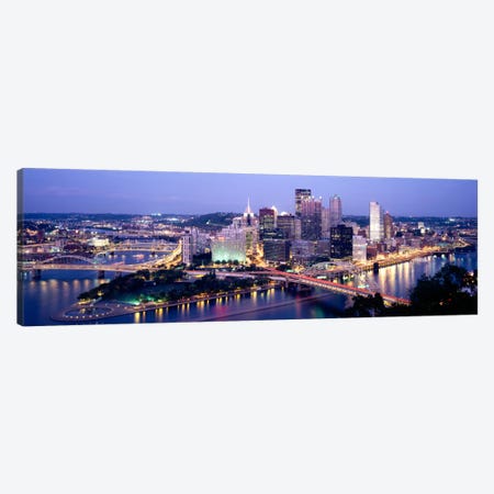 Buildings in a city lit up at dusk, Pittsburgh, Allegheny County, Pennsylvania, USA Canvas Print #PIM2260} by Panoramic Images Canvas Print