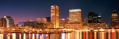 Buildings lit up at dusk, Baltimore, Maryland, USA by Panoramic Images canvas print