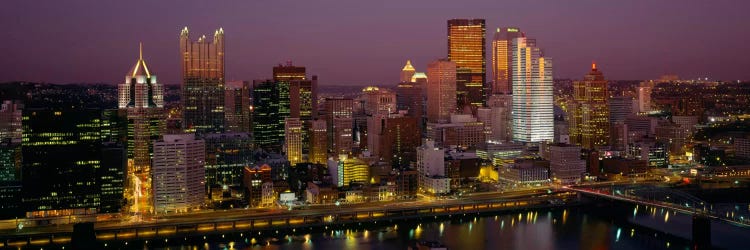 High angle view of buildings lit up at night, Pittsburgh, Pennsylvania, USA