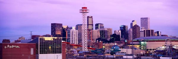 Building lit up at dusk, Denver, Colorado, USA