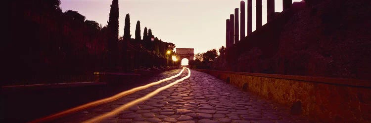 Ruins along a road at dawnRoman Forum, Rome, Lazio, Italy