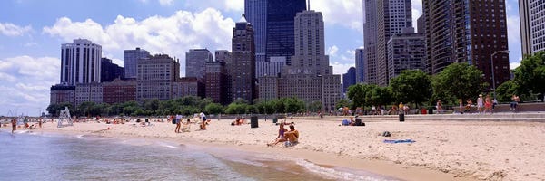 Chicago Skylines: Group of people on the beachOak Street Beach, Chicago, Illinois, USA by Panoramic Images