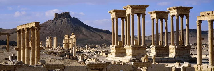 The Tetrapylon Of The Great Colonnade With A Distant View Of Fakhr-al-Din al-Ma'ani Castle, Palmyra, Homs Governorate, Syria