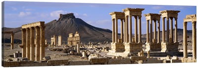 The Tetrapylon Of The Great Colonnade With A Distant View Of Fakhr-al-Din al-Ma'ani Castle, Palmyra, Homs Governorate, Syria Canvas Art Print - Column Art