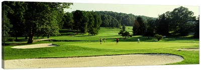 Four people playing on a golf course, Baltimore County, Maryland, USA Canvas Art Print - Golf Art