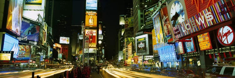 Neon boards in a city lit up at night Times Square, New York City, New York State, USA