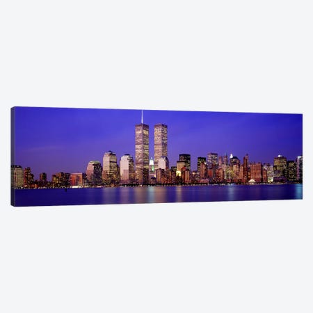 Buildings at the waterfront lit up at dusk, World Trade Center, Wall Street, Manhattan, New York City, New York State, USA Canvas Print #PIM2644} by Panoramic Images Canvas Wall Art