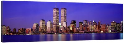 Buildings at the waterfront lit up at dusk, World Trade Center, Wall Street, Manhattan, New York City, New York State, USA Canvas Art Print