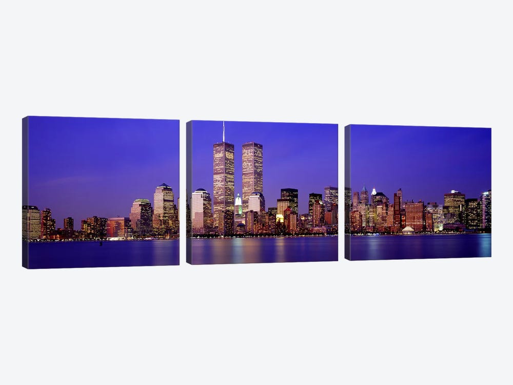 Buildings at the waterfront lit up at dusk, World Trade Center, Wall Street, Manhattan, New York City, New York State, USA by Panoramic Images 3-piece Canvas Art